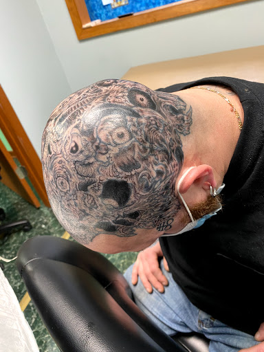 Explore back of leg tattoo ideas, creative tattoo ideas in Aurora, available at Ronin Tattoo Studio INC