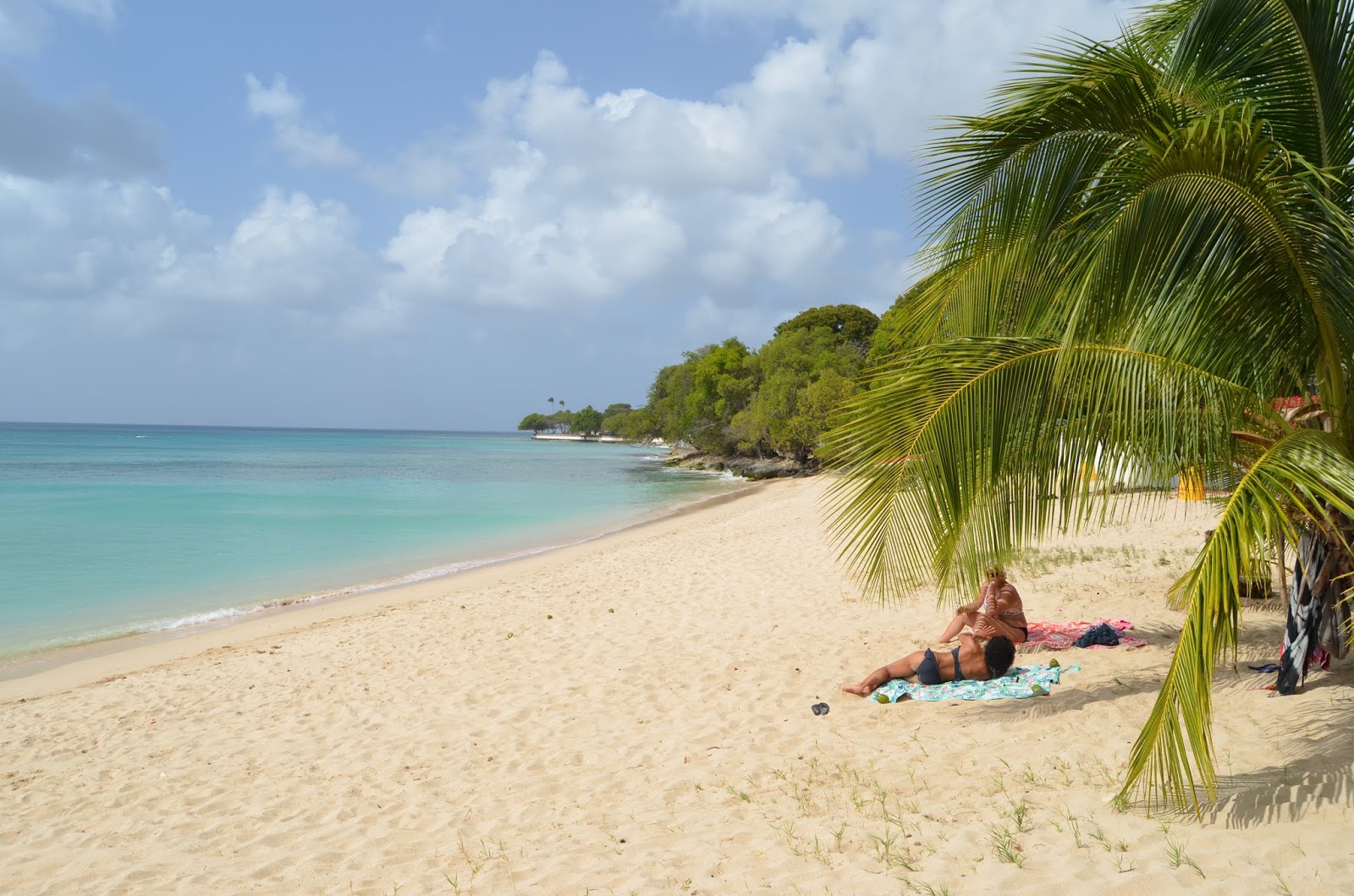 Foto di Fosters beach con una superficie del sabbia beige