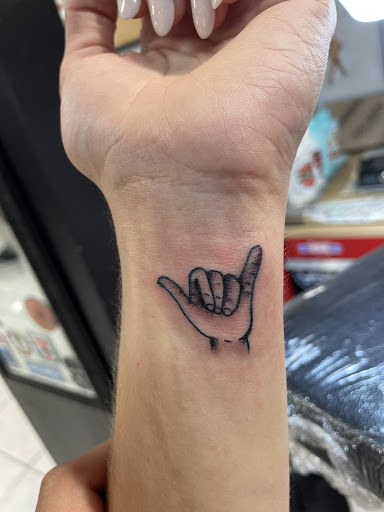 Explore female finger tattoo ideas, creative tattoo ideas in Honolulu, available at Sacred Art Tattoo Waikiki