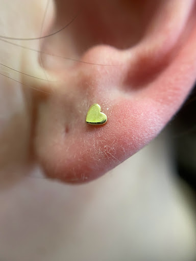 Explore passing away tattoo ideas, creative tattoo ideas in Orange, available at Symbiosis Body Piercing