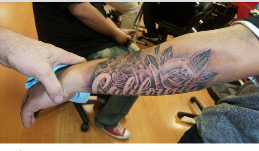 Explore tattoo ideas that represent family, creative tattoo ideas in Modesto, available at Young Guns Tattoo Studio