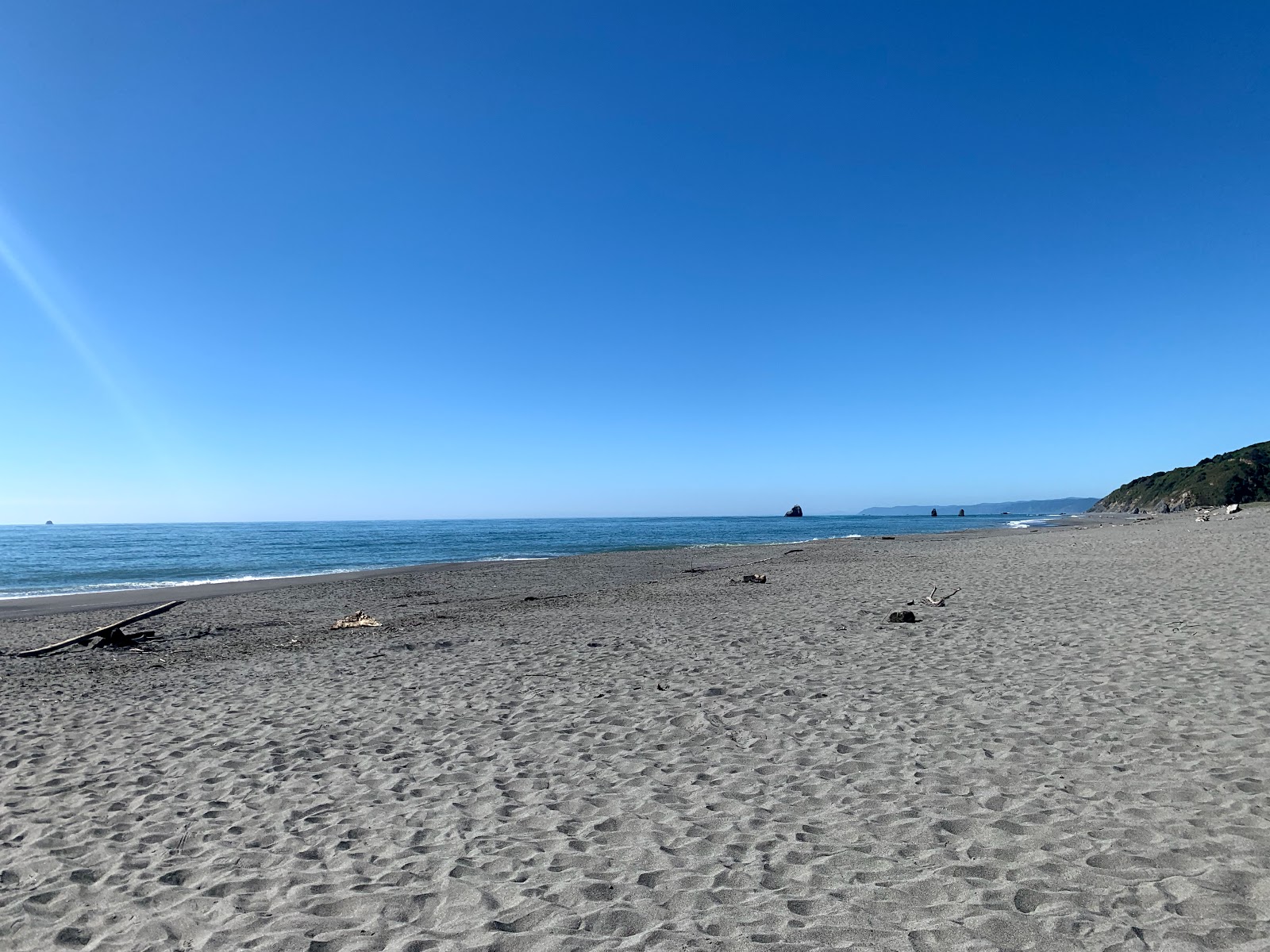 Photo of Orick Beach with turquoise water surface