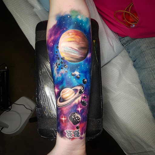 Explore finger hand tattoo ideas, creative tattoo ideas in Tea, available at Red Arbor Tattoo