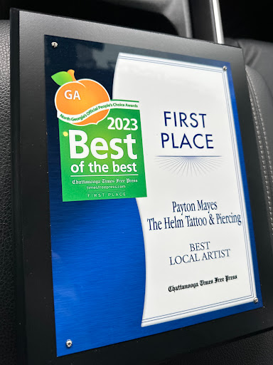 Explore thigh hip tattoo ideas, creative tattoo ideas in Fort Oglethorpe, available at The Helm Tattoo & Piercing