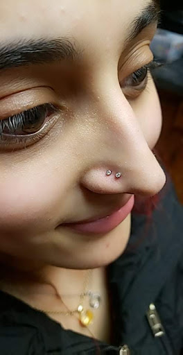 Explore sewing tattoo ideas, creative tattoo ideas in Valparaiso, available at Elysium Studios