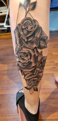 Explore grandchild tattoo ideas, creative tattoo ideas in Rochester, available at Altered Image Tattoo