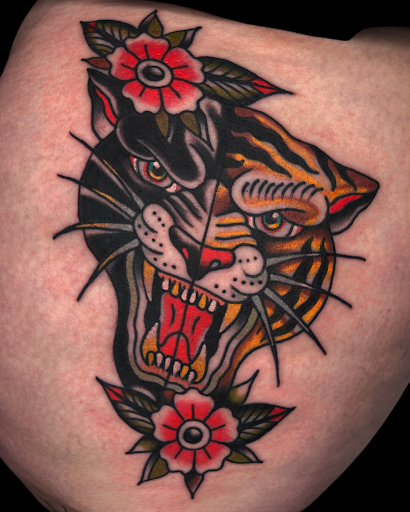 Explore wolverine tattoo ideas, creative tattoo ideas in Johnson City, available at Gold Cross Tattoo Co.