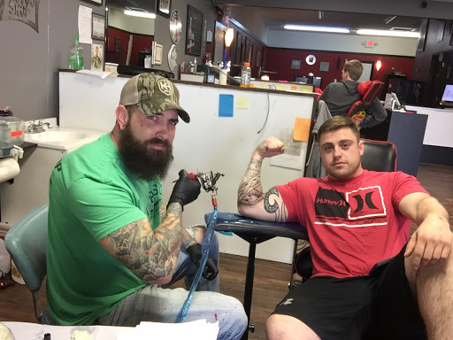 Explore anunnaki tattoo ideas, creative tattoo ideas in Hendersonville, available at Endless Kreations Custom Tattoo & Piercing LLC