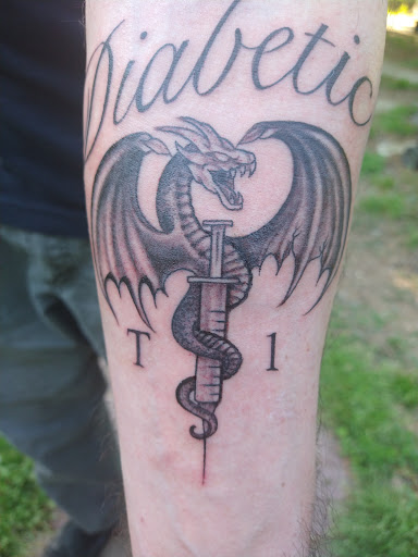 Explore fist tattoo ideas, creative tattoo ideas in Calhoun, available at A Sailors Grave Tattoo Parlor