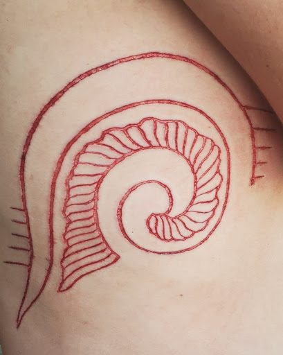 Explore simple flower tattoo ideas, creative tattoo ideas in Phoenix, available at Wholehearted Body Piercing