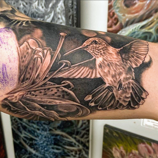 Explore small tattoo ideas behind ear, creative tattoo ideas in San Diego, available at Funhouse Tattoo