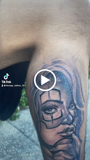 Explore justice tattoo ideas, creative tattoo ideas in Dallas, available at Empire barbers & Ink