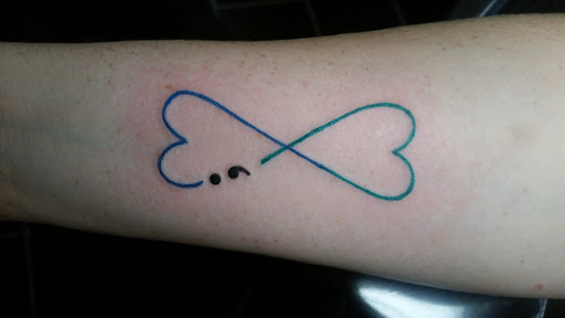 Explore barb wire tattoo ideas, creative tattoo ideas in Erie, available at EliKingInk