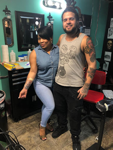 Tattoo Shop «The Divine Canvas Tattoos, Photography and Fine Art», reviews and photos, 1921 E Colonial Dr, Orlando, FL 32803, USA