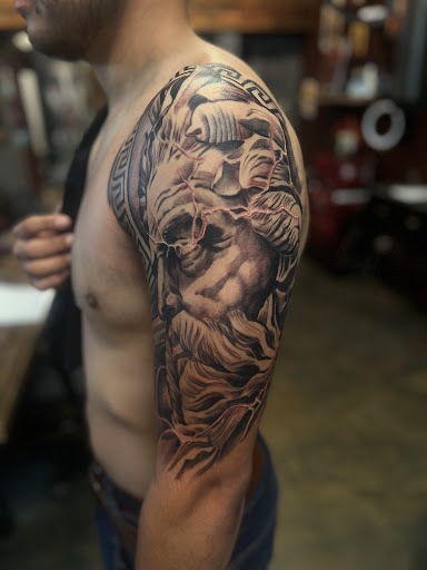 Explore barber pole tattoo ideas, creative tattoo ideas in El Paso, available at Steady Ink Tattoo Studio