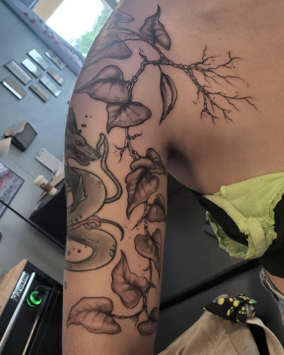 Explore child tattoo ideas for mom, creative tattoo ideas in Palm Harbor, available at Angry Owl Tattoo and Piercing