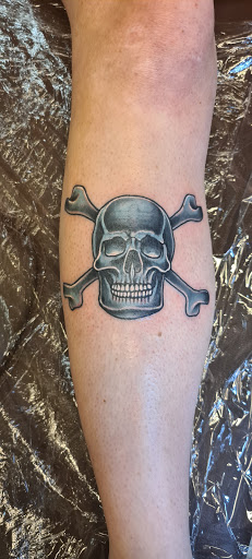 Explore small dog tattoo ideas, creative tattoo ideas in Sturgis, available at The Tattoo Cellar