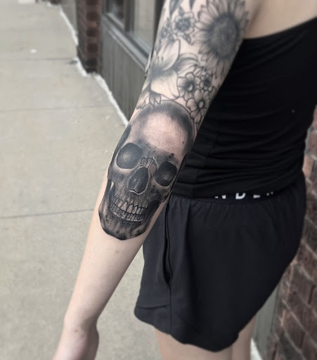 Explore leprechaun tattoo ideas, creative tattoo ideas in Saint Paul, available at Black Coffin Tattoo