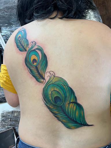 Find cool dog tattoo ideas for your next unique tattoo in Rogers at Ink Solutions Tattoo