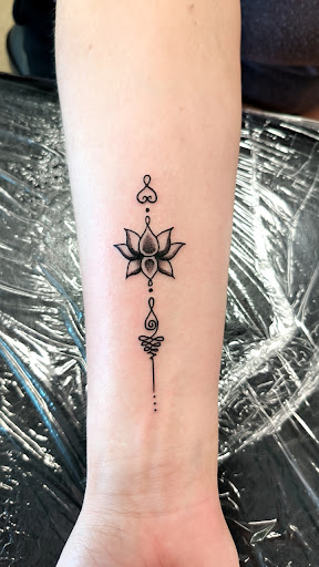 Explore athlete tattoo ideas, creative tattoo ideas in Omaha, available at American Tattoo & Body Piercing