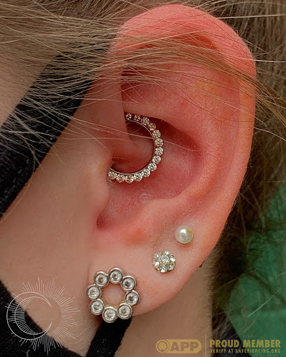 Explore sexy tattoo ideas for men, creative tattoo ideas in Appleton, available at Celestial Piercing- Inside of Big Guns Tattoo