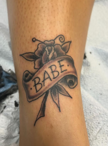 Explore color tattoo cover up ideas, creative tattoo ideas in New Orleans, available at Downtown Tattoos and Piercing