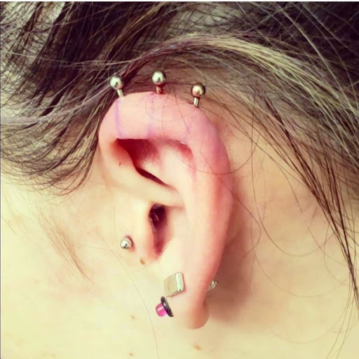 Find best small tattoo ideas for guys for your next unique tattoo in Summerville at Exotic Impressions Body Piercing