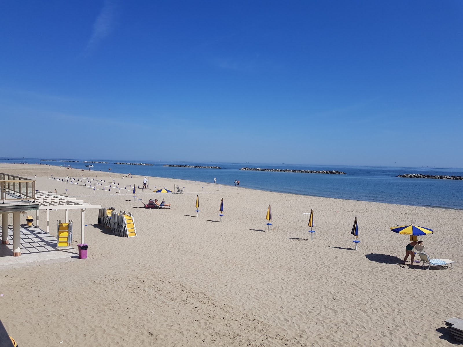 Foto van Strand van Lido Adriano met recht en lang