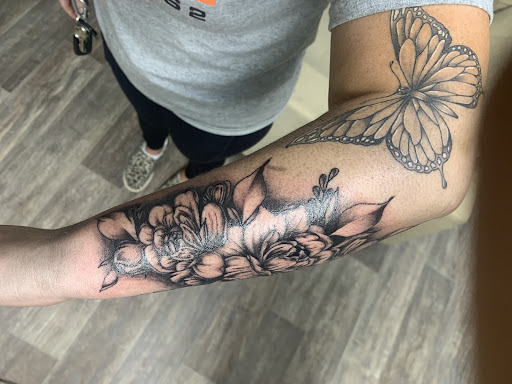 Explore front thigh tattoo ideas, creative tattoo ideas in Kirksville, available at Bedford Legacy Tattoo and Body Piercing