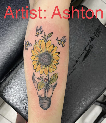 Explore woodstock tattoo ideas, creative tattoo ideas in Foley, available at Symbolic Ink Tattoo Studio