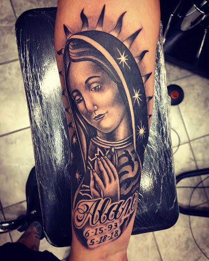 Explore mens rose tattoo ideas, creative tattoo ideas in Enid, available at Culture Tattoo