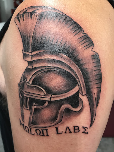 Explore thigh tattoo ideas men, creative tattoo ideas in Vincennes, available at Vincennes Tattoo Co.