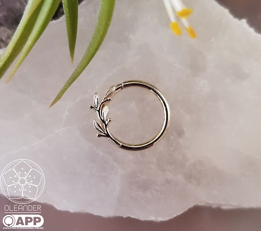 Explore small book tattoo ideas, creative tattoo ideas in Worcester, available at Oleander Piercing