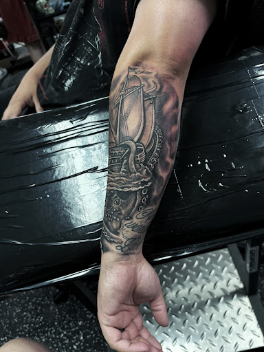 Explore arm filler tattoo ideas, creative tattoo ideas in Fort Myers, available at Loyal 2 The Coil Tattoos & Piercings (Edison Mall Location Entrance F)