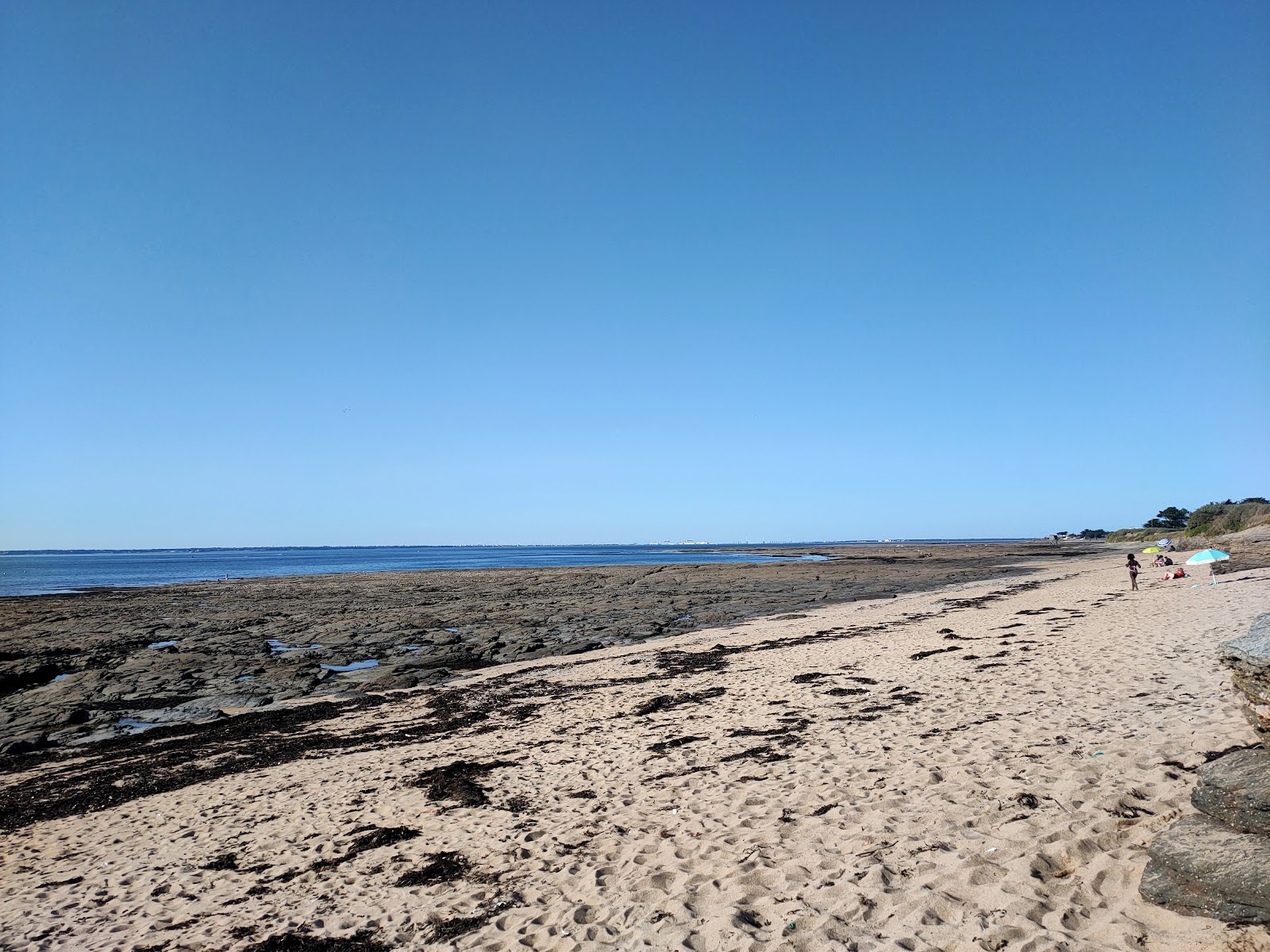 Zdjęcie Plage de St. Gildas z powierzchnią beżowy piasek