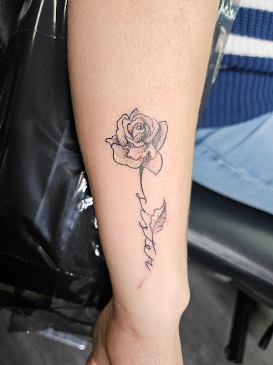 Explore kiss band tattoo ideas, creative tattoo ideas in Bakersfield, available at Monster Ink