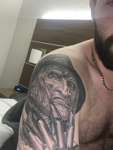 Explore bookish tattoo ideas, creative tattoo ideas in Seymour, available at Sacred Art Tattoo