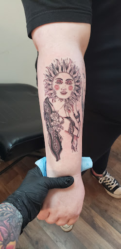 Explore temple tattoo ideas, creative tattoo ideas in Cornelia, available at Prismatic Pulse Tattoo