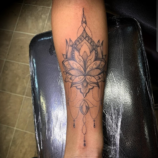 Explore book tattoo ideas for females, creative tattoo ideas in Rehoboth Beach, available at Tattoo Galaxy (Rehoboth Beach) Piercing & Custom tattoos