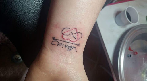 Explore adoption tattoo ideas, creative tattoo ideas in Davis, available at SIX GUN SOUND TATTOO