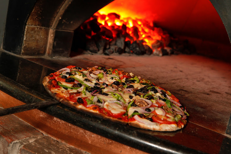 Best Thin Crust pizza place in Fort Myers - Capone's Coal Fired Pizza
