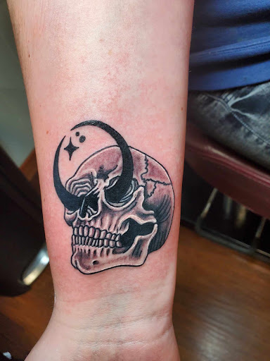 Explore bookworm tattoo ideas, creative tattoo ideas in Independence, available at Odins Mark Tattoo and Emporium