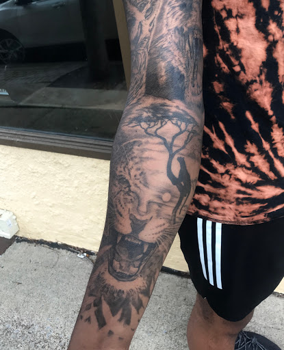 Explore catfish tattoo ideas, creative tattoo ideas in Sunbury, available at Absinthe Tattoo