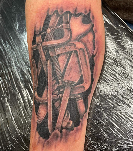 Find small wolf tattoo ideas for your next unique tattoo in Shelbyville at Stage Left Tattoo and Piercing