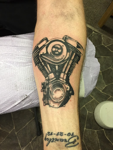 Explore tattoo ideas for alzheimer's, creative tattoo ideas in Calumet, available at Tattooing by Big Ben