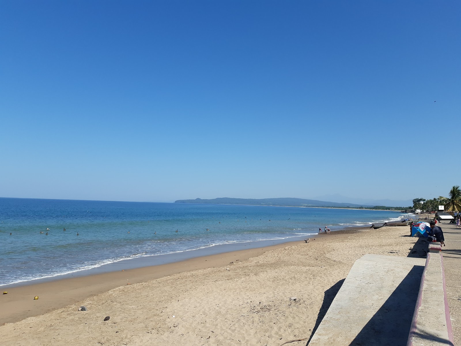 Fotografija El Naranjo beach II z svetel fin pesek površino