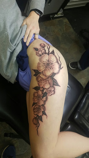 Explore back of thigh tattoo ideas, creative tattoo ideas in Orange, available at Orange County Tattoos