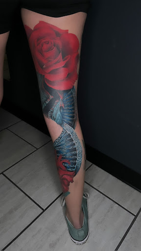 Explore female elbow tattoo ideas, creative tattoo ideas in Cadillac, available at Limitless Ink Tattoo Studio