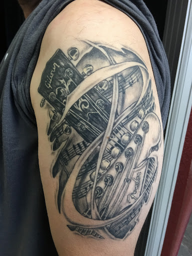Explore badass mens tattoo ideas, creative tattoo ideas in Alamosa, available at Ink Pusher