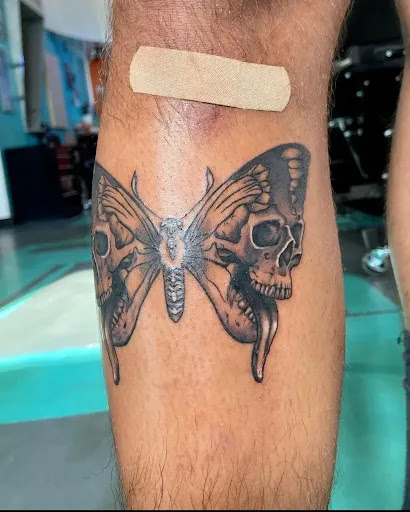 Explore flower finger tattoo ideas, creative tattoo ideas in Houston, available at Los Muertos Tattoo Studio and Art Gallery